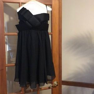 Super cute black strapless dress with bow detail